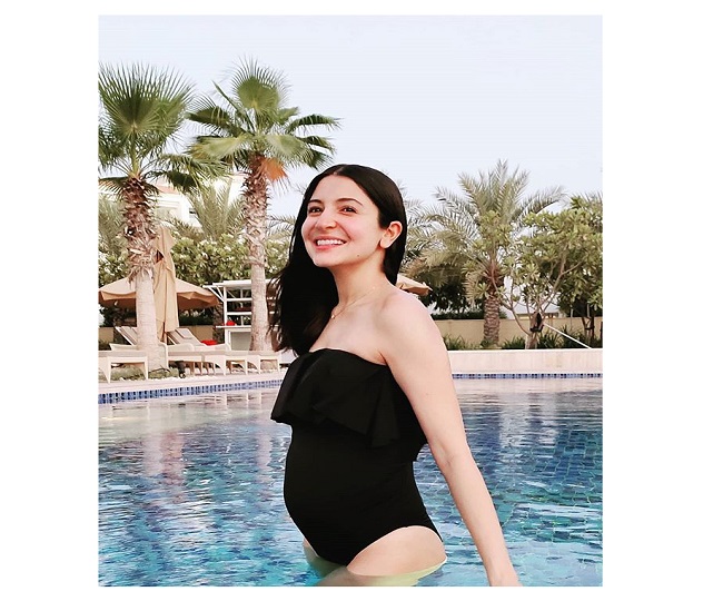 Mommy-to-be Anushka Sharma chilling in swimming pool, flaunts baby bump in black monokini | See Photos